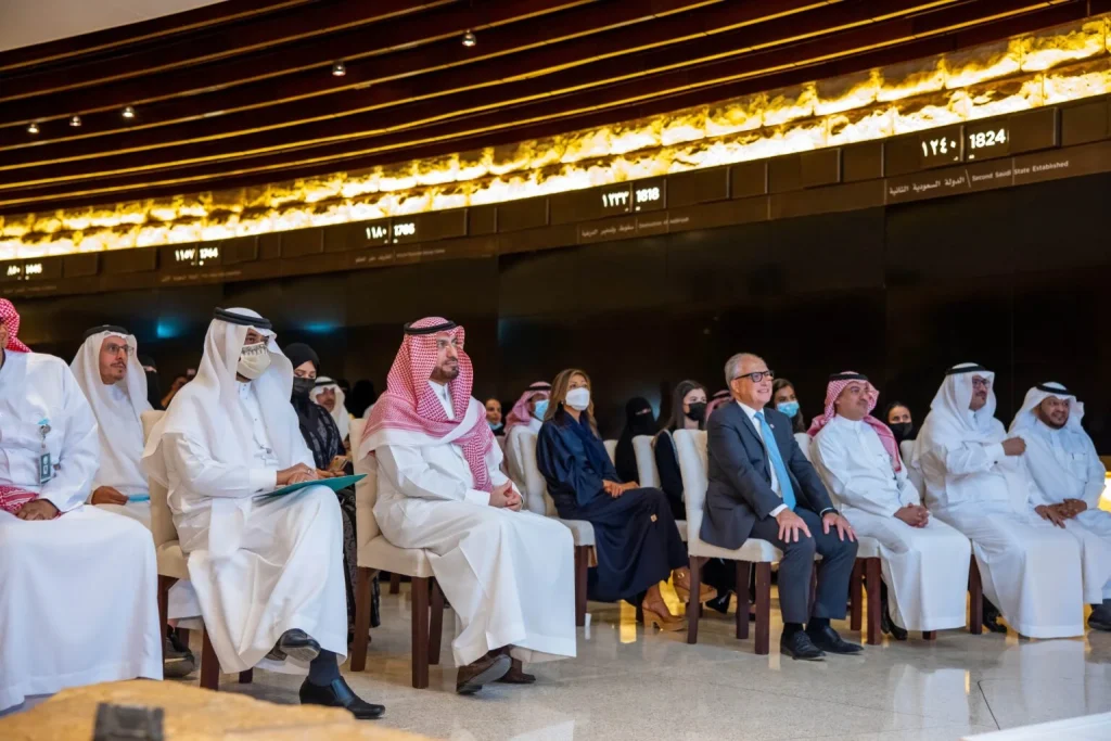 Audience seated at an indoor event